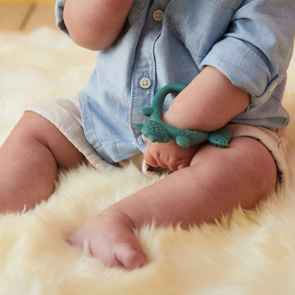 child with Wrist Teether - Blush - b.box for kids