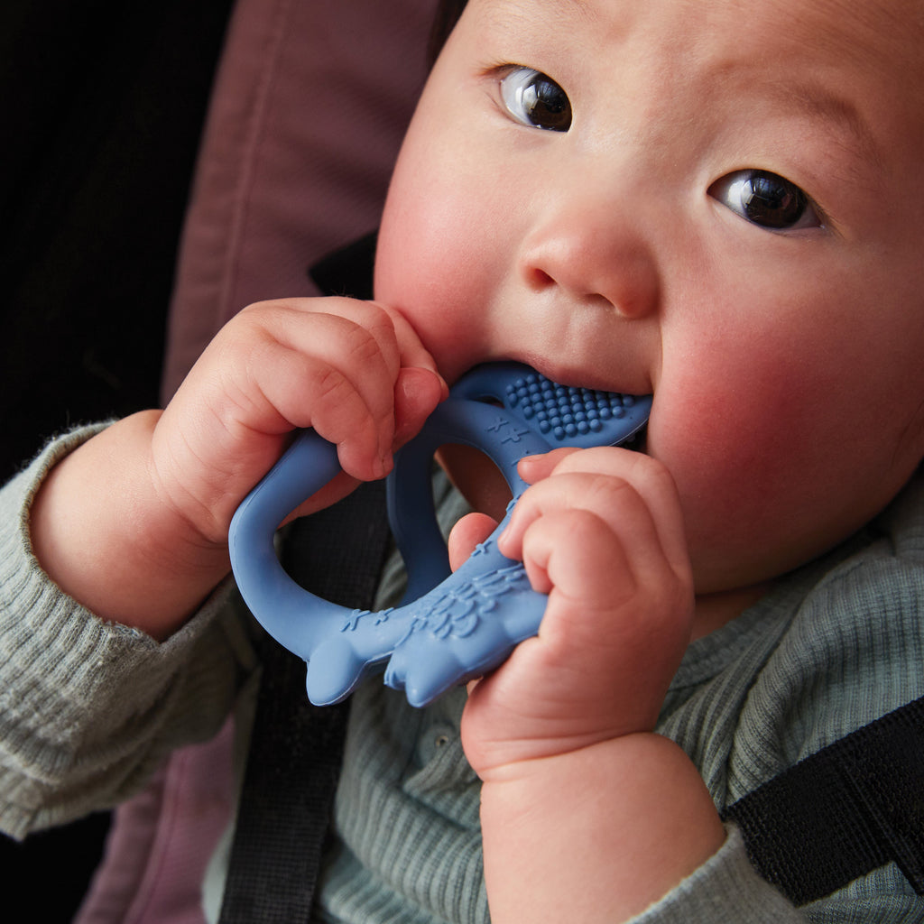 child with Wrist Teether - Lullaby Blue - b.box for kids