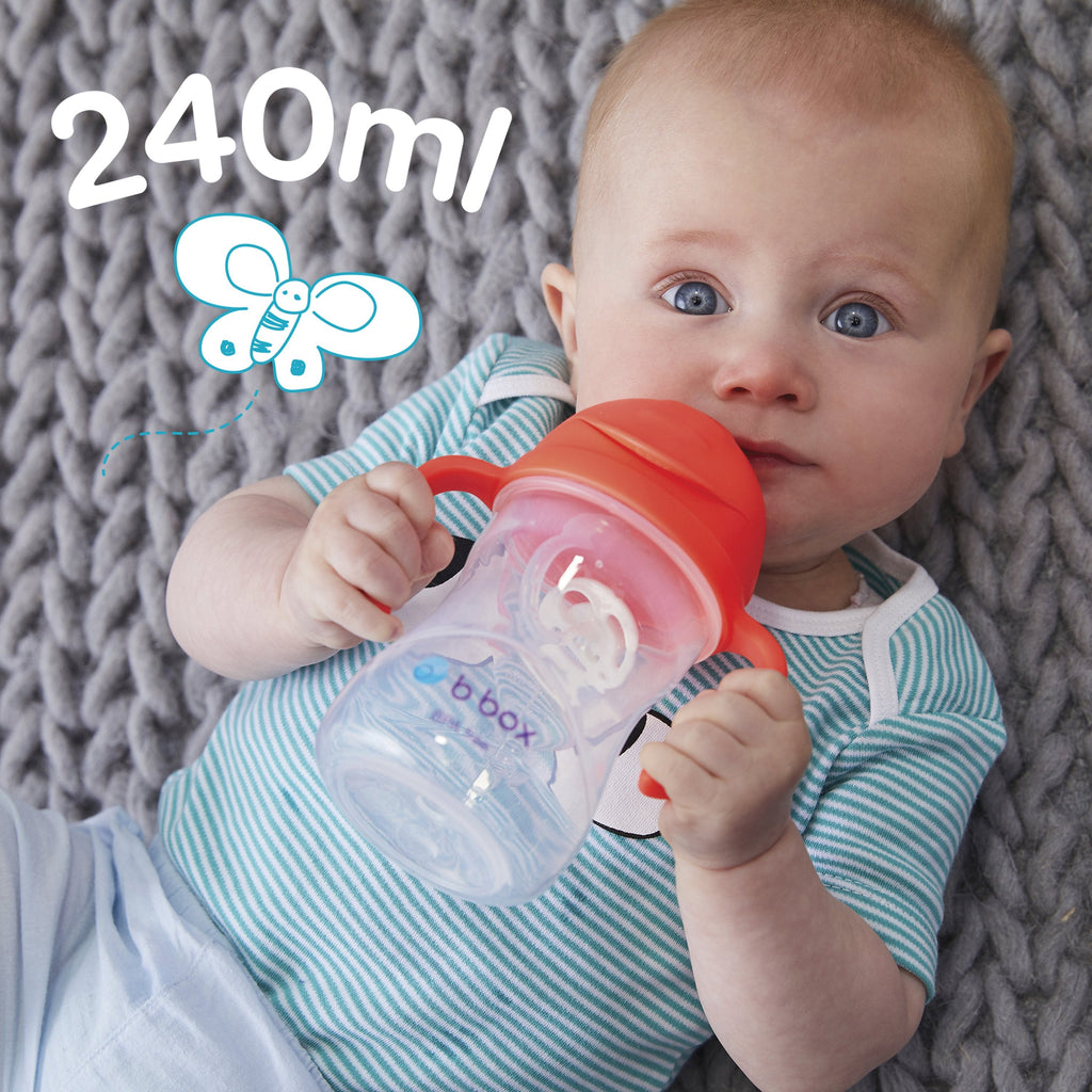 child with sippy cup - raspberry - b.box for kids