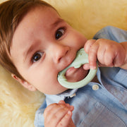child with Trio Teether - Sage - b.box for kids