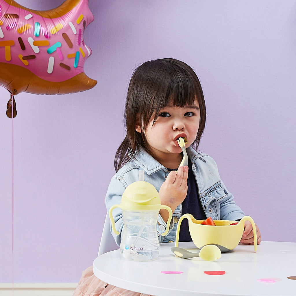 child with Toddler cutlery set - banana split - b.box for kids