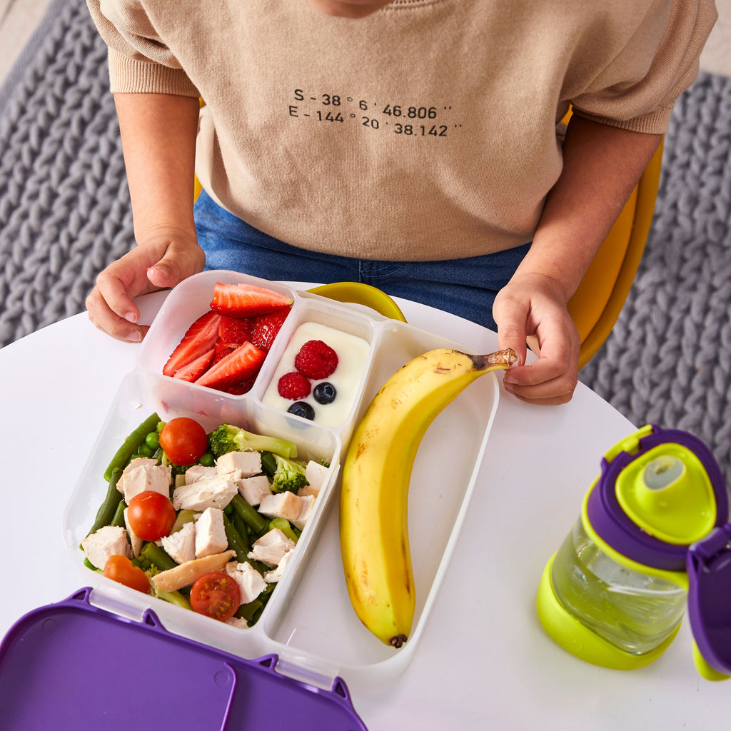 child with lunchbox - emerald forest - b.box for kids